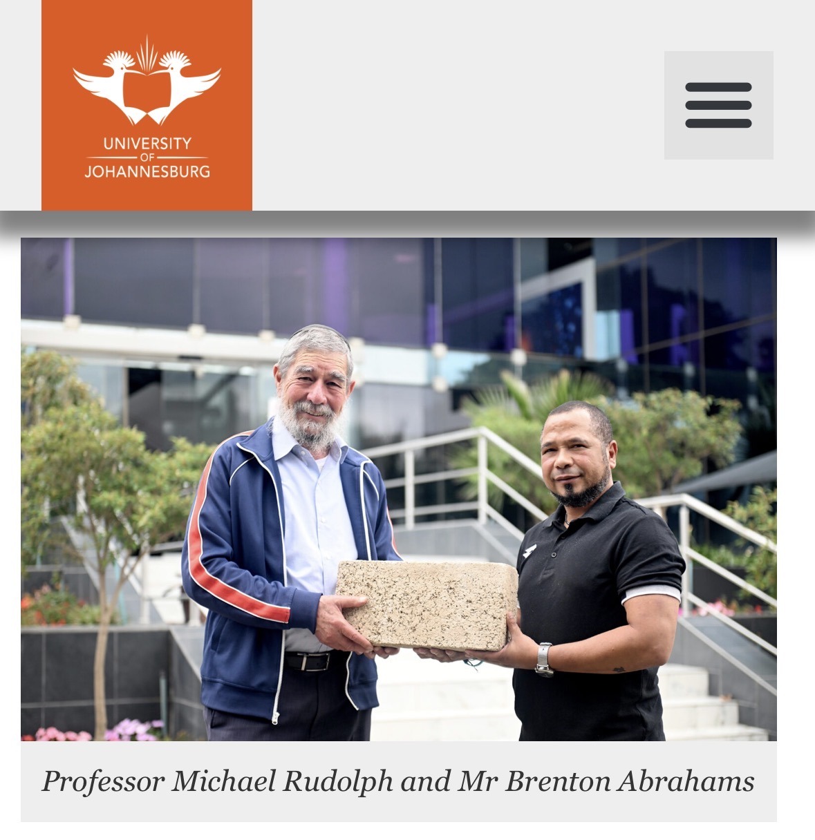 Professor Michael Rudolph and Mr Brenton Abrahams holding a hemp brick at the University of Johannesburg